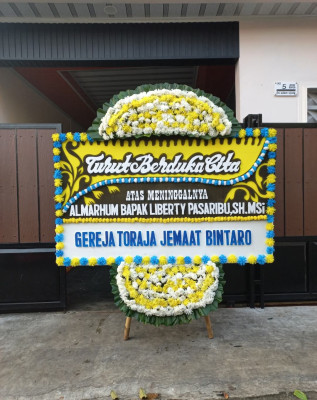 Papan Bunga Duka di Arenjaya